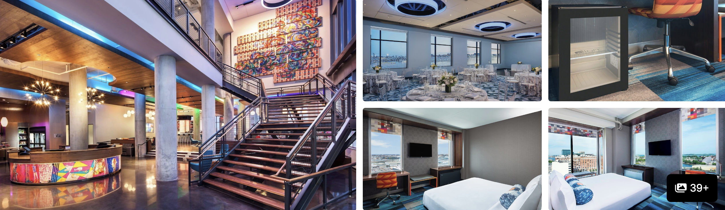 Photos of a Seaport District hotel in Boston: atrium staircase, mural lounge and modern guest rooms