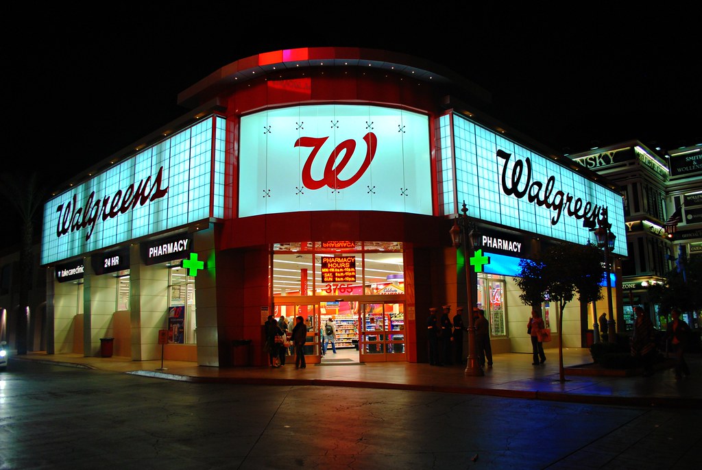 CVS pharmacy and MinuteClinic on the Las Vegas Strip with large CVS sign and traffic blurring past