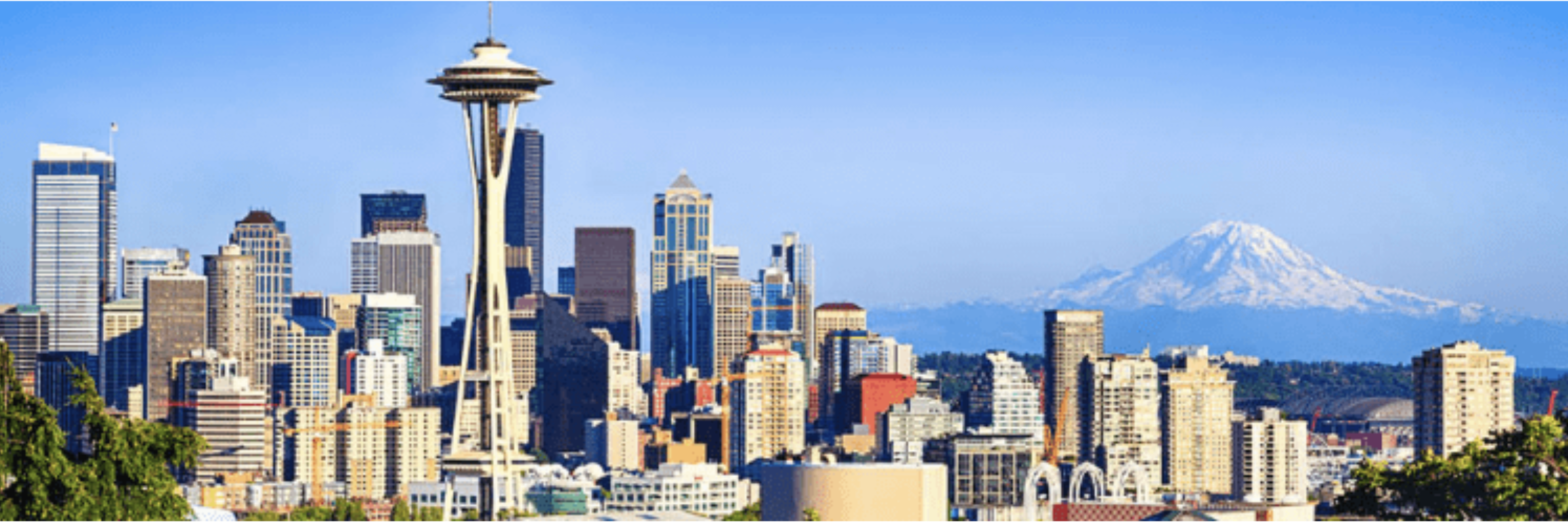 Seattle skyline with the Space Needle and snow-capped Mount Rainier in the distance