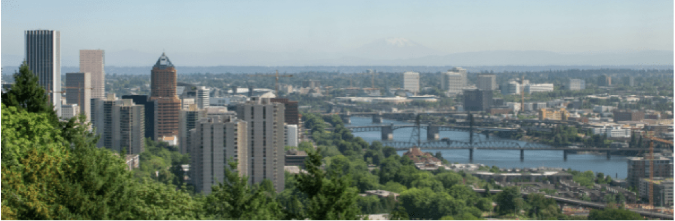 Portland skyline with downtown towers and bridges crossing the Willamette River