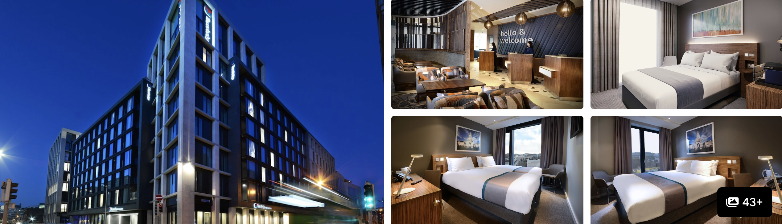 Photos of Travelodge Plus Dublin City Centre: illuminated modern exterior at night and contemporary guest rooms