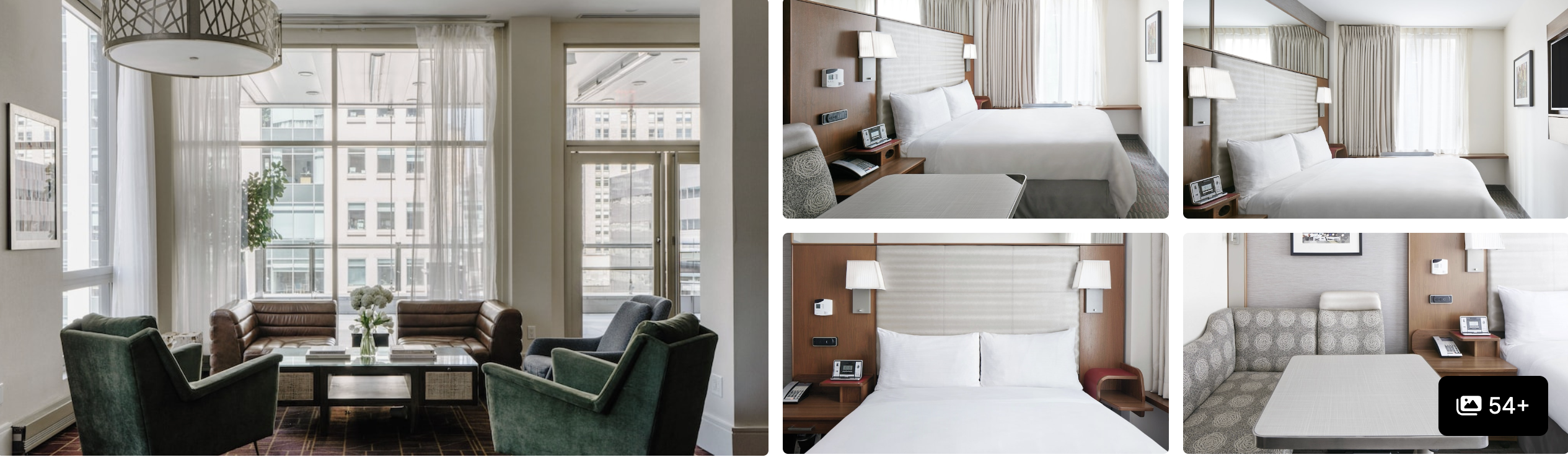 Photos of Club Quarters Hotel Grand Central: bright lounge with green armchairs, city-view windows and white guest rooms