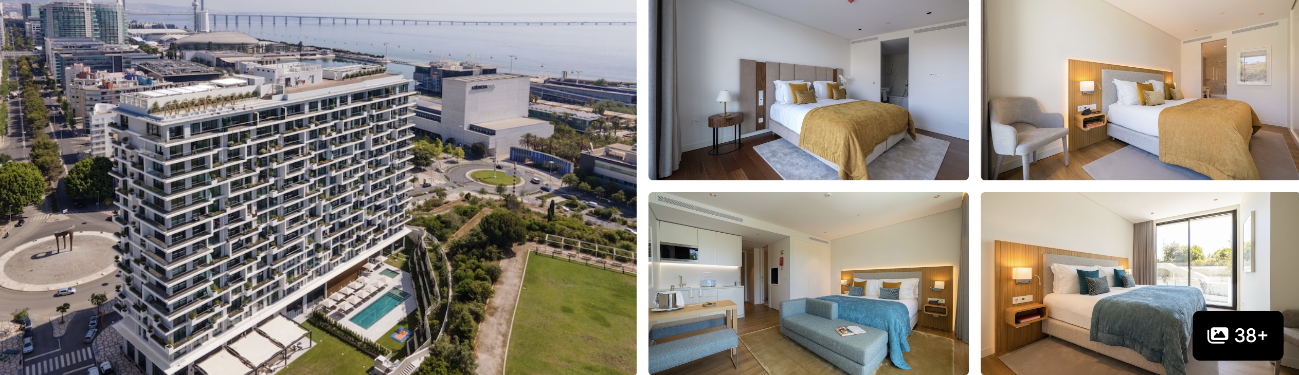 Photos of Melia Lisboa Aeroporto: aerial view of high-rise hotel with pool and several modern guest rooms