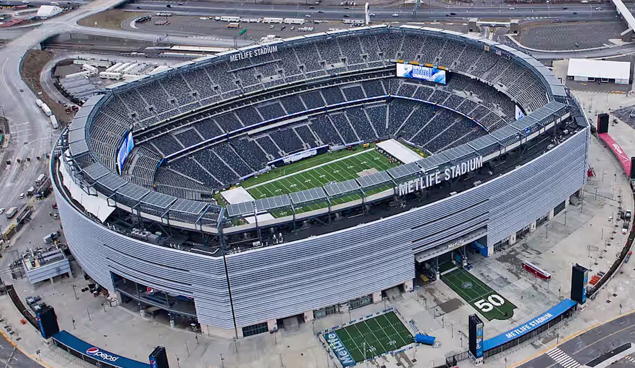 Photos of a hotel near MetLife Stadium, New York and New Jersey: green-toned guest rooms, lounge and bedroom decor