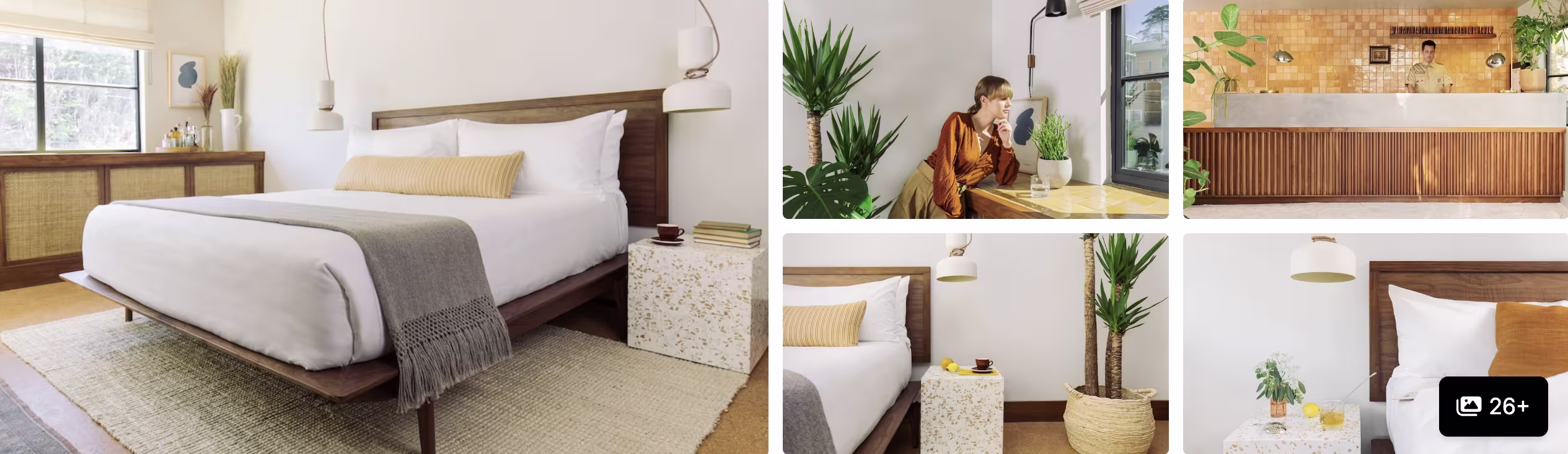Photos of Los Feliz Lodge: lit corner building at night, reception desk, hallway and bunk-bed rooms