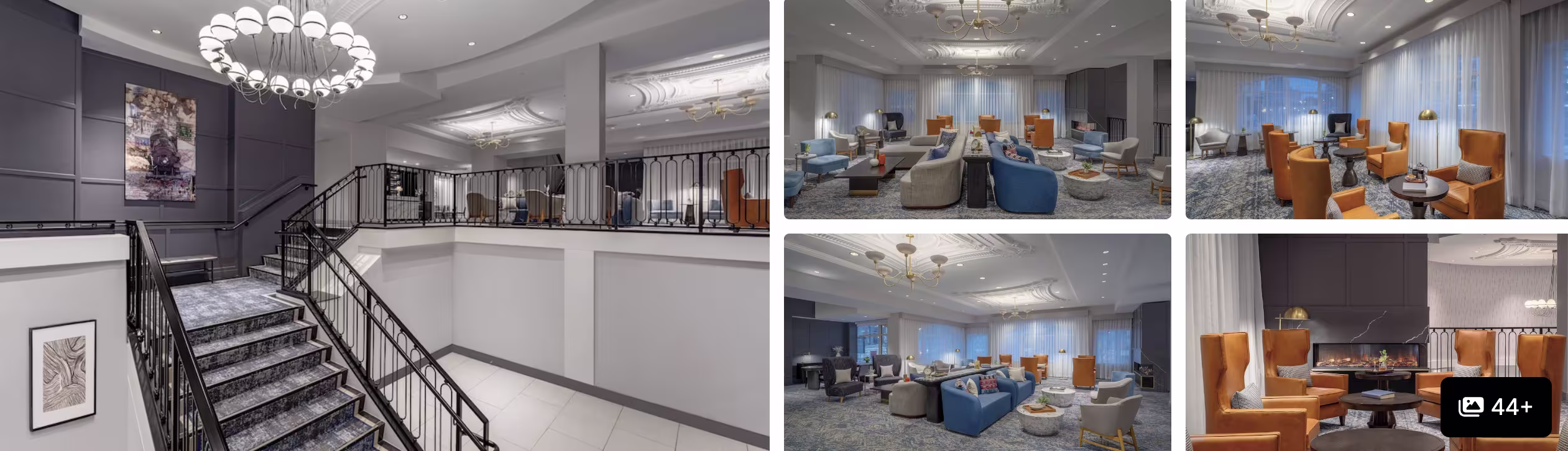Photos of a Kenmore Square Boston hotel: grand staircase lobby and elegant lounges with blue and orange armchairs