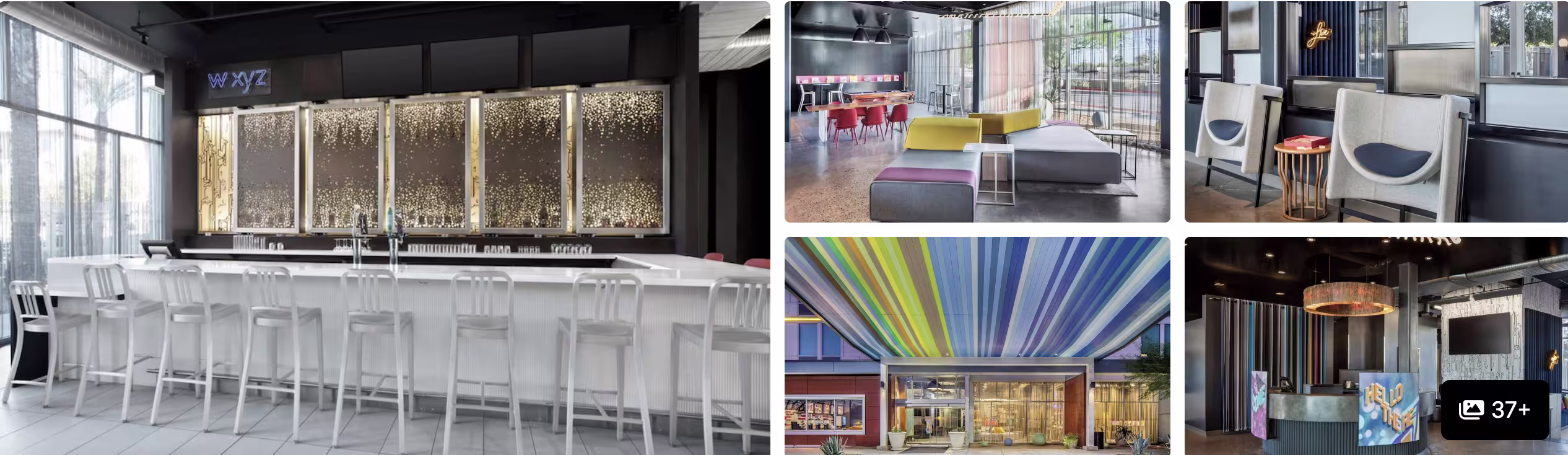 Photos of Aloft Phoenix Airport: white bar lounge, colorful seating areas, striped ceiling installation and lobby entrance