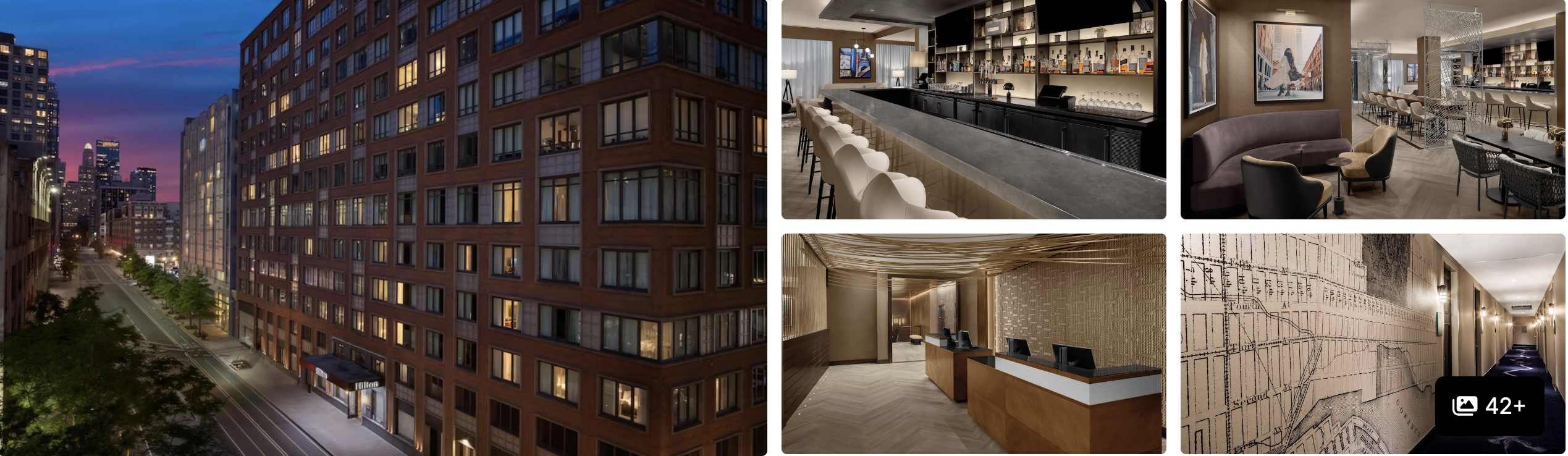 Photos of 1 Hotel Brooklyn Bridge: brick high-rise exterior at dusk, lobby bar, wood-paneled lounge and reception
