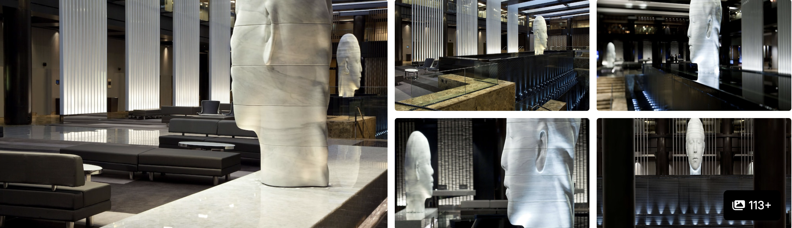 Photos of Hyatt Grand Central New York: dramatic lobby with sculpted columns and an illuminated face sculpture