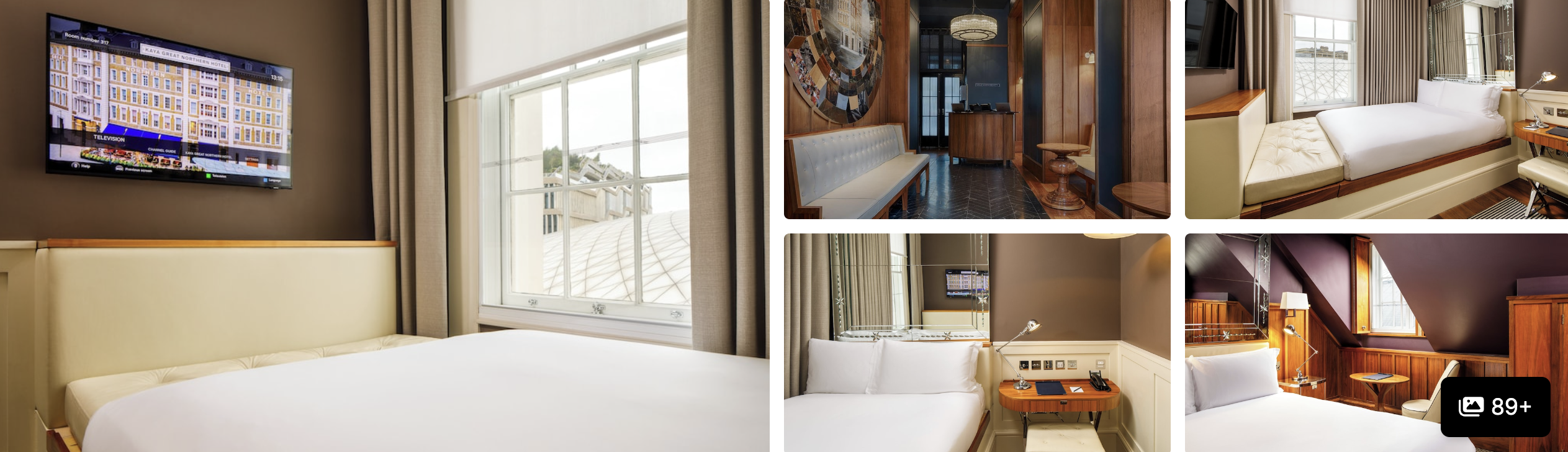 Photos of Great Northern Hotel, London: guest room with TV and bright window, hallway and beds with wood detailing