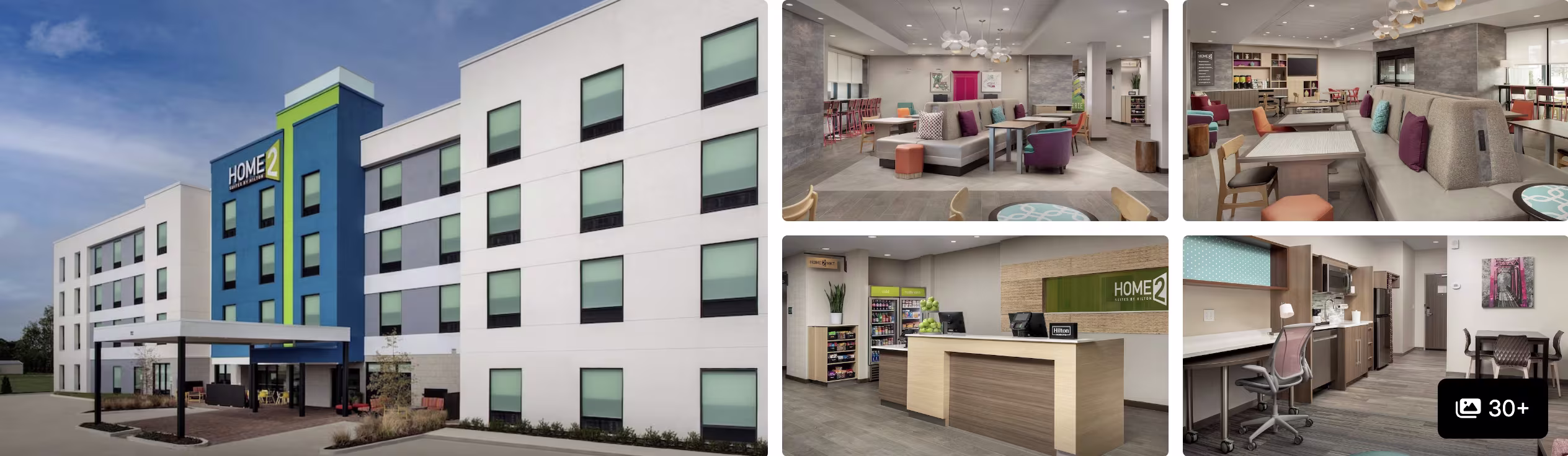Photos of a Home2 extended-stay hotel near MSY Airport: modern exterior, lobby lounge, front desk and in-room kitchen workspace
