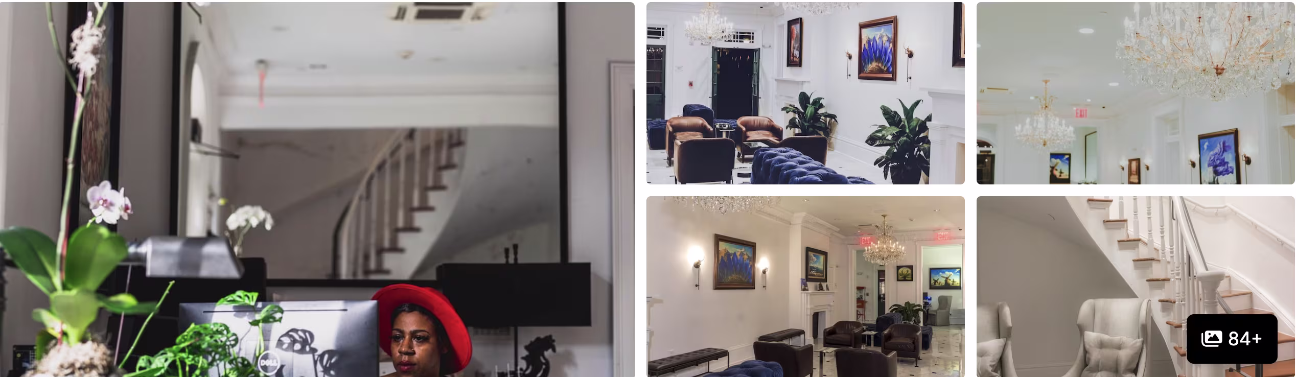 Photos of a Marigny guesthouse, New Orleans: bright white parlors with chandeliers, curved staircase and lounge seating