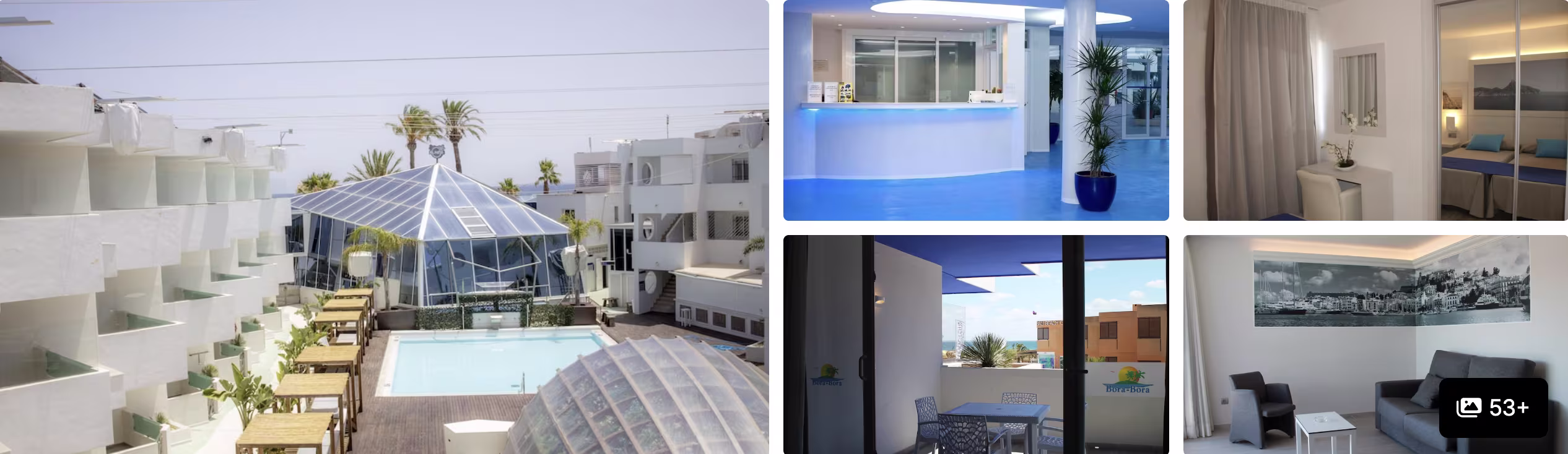Photos of a Grand Palladium all-inclusive resort, Ibiza: domed pool courtyard, blue lobby, terrace and guest room
